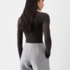 Das Merino-Langarm-Poloshirt Transparentes Strick-Poloshirt
