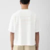 Das Torsade-T-Shirt T-Shirt mit beflocktem Logo
