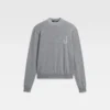 Der Tricot-Strickpullover mit Monogramm