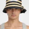 Der Vela-Hut Gefalteter Raffia-Bucket-Hut
