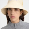 Der Vela-Hut Gefalteter Raffia-Bucket-Hut