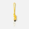 Die Banane Knotiger Taschenanhänger in Bananenform
