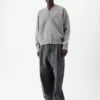 Die geknöpfte Strickjacke Geknöpfte Strickjacke