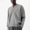 Die geknöpfte Strickjacke Geknöpfte Strickjacke