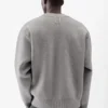 Die geknöpfte Strickjacke Geknöpfte Strickjacke