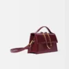 Die große Bambino Crossbody-Tasche mit Metallklappe