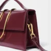 Die große Bambino Crossbody-Tasche mit Metallklappe
