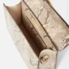 Die große Bambino Crossbody-Tasche mit Metallklappe