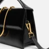 Die große Bambino Crossbody-Tasche mit Metallklappe