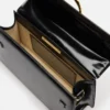 Die große Bambino Crossbody-Tasche mit Metallklappe