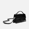 Die große Bambino Crossbody-Umhängetasche