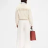 Die JACQUEMUS-Strickjacke Signature-Strickjacke