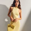 Die kleine asymmetrische Mini-Beuteltasche Bambola