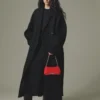 Die kleine Schultertasche Bisou Chaine Small