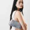 Die kleine Schultertasche Bisou Chaine Small