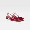 Die niedrigen Duelo-Slingbacks Runde und eckige Kitten Heels