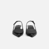 Die niedrigen Duelo-Slingbacks Runde und eckige Kitten Heels