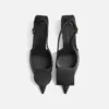 Die niedrigen Duelo-Slingbacks Runde und eckige Kitten Heels