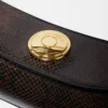 Die Ovalo-Clutch Gefaltete Umhängetasche