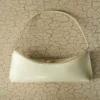 Die Ovalo-Clutch Gefaltete Umhängetasche