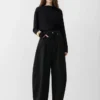 Die Ovalo de-Nîmes Jeans Hose Hoch taillierte, geschwungene Jeans
