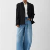 Die Ovalo de-Nîmes Jeans Hose Hoch taillierte, geschwungene Jeans