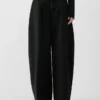 Die Ovalo de-Nîmes Jeans Hose Hoch taillierte, geschwungene Jeans