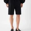 Die Ovalu-Shorts Taillierte Bermudashorts