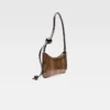 Die Schultertasche Bisou Perle mit Perlenverzierung