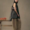 Die Schultertasche Bisou Perle mit Perlenverzierung