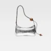 Die Schultertasche Bisou Perle mit Perlenverzierung