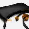 Die Schultertasche Bisou Perle mit Perlenverzierung